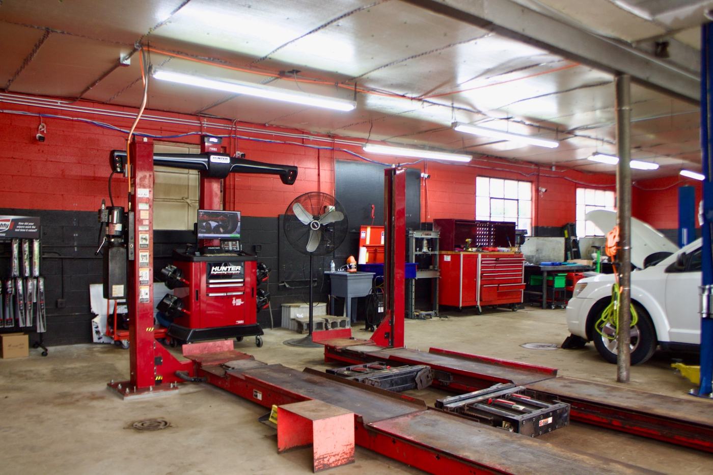 Service bay with alignment and diagnostic equipment at Auto Pro Services in Nashville